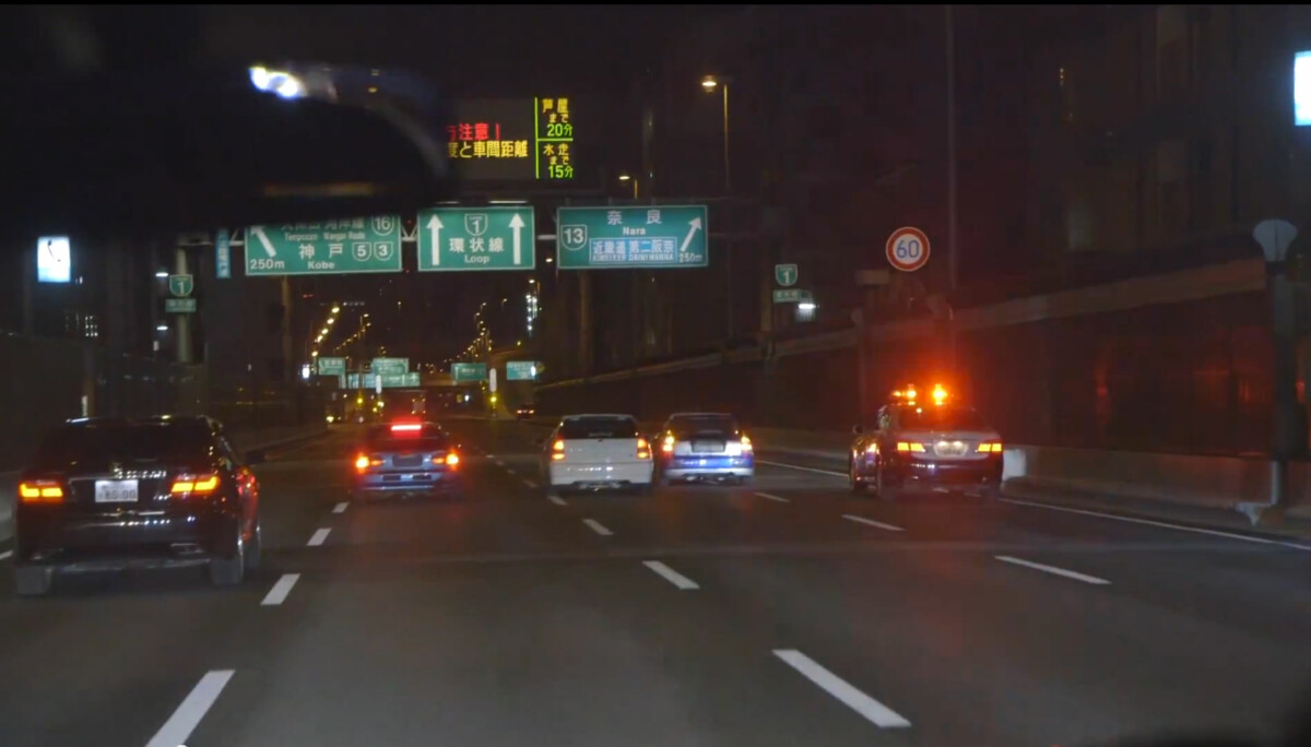 Kanjozoku boxing in a police car